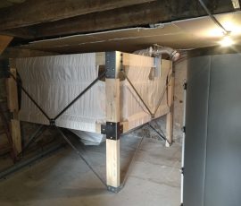 Silo textile à granulés bois surélevé pour chaudière biomasse installé à Essert– structure renforcée réalisée par WT TOUS TRAVAUX